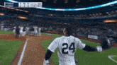 a baseball player with the number 24 on the back of his shirt