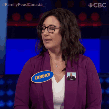 a woman with glasses and a name tag that says candice on it