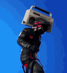 a man with a boombox on his head is standing in the air .
