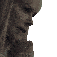 a close up of a woman 's face with her hand to her chin
