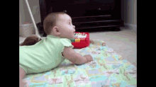 Baby Laughing At Barking Dog GIF - Baby Dogs Cute GIFs