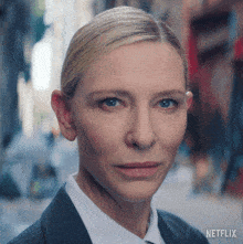 a close up of a woman 's face with netflix on the bottom right