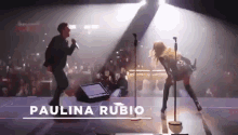 the name paulina rubio is on the bottom of the screen