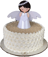 a white cake with a paper angel on top of it