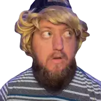a man with a beard and blonde hair is wearing a hat