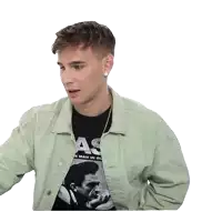 a man wearing a black shirt that says ' as the man in black ' on it