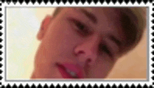 a close up of a man 's face in a frame