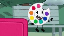 a cartoon drawing of a palette with a face and arms