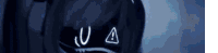 a close up of a person wearing a hoodie with the letter u and a on it