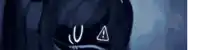 a close up of a person wearing a hoodie with the letter u and a on it