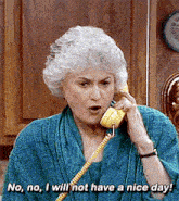 an elderly woman is talking on a yellow telephone and saying no no i will not have a nice day