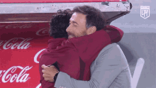 Hugging Marcelo Gallardo GIF - Hugging Marcelo Gallardo Kily González GIFs