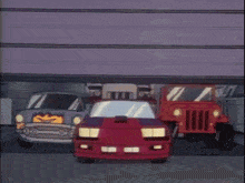 three cartoon cars are parked in a garage including a red car