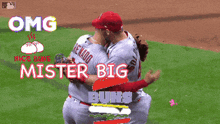 two baseball players are standing next to each other and one has the number 28 on the back of his jersey