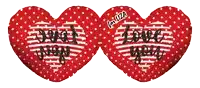 a pair of red heart shaped pillows that say " love you "