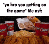 a can of cane 's soda sits next to a tray of fried food