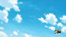 a blue sky with white clouds and a cn logo on the bottom