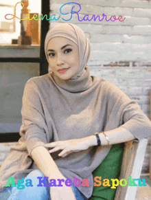 a woman wearing a hijab sits in a chair with the name liena ranroe written on the bottom