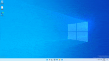 a computer screen shows a blue background with a few icons on it