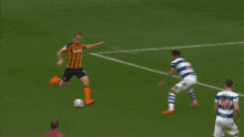 a blurry picture of a soccer game with a sign that says ' sky bet ' on it