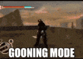 a man is holding a sword in a video game and the words going mode are written on the screen .