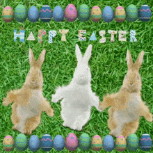 three bunny rabbits are dancing in the grass with easter eggs surrounding them