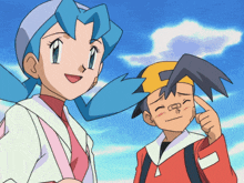 a boy and a girl standing next to each other