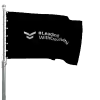 a black flag with the words leading with creativity written on it