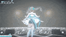 a girl in a blue and white dress is dancing on a stage ..