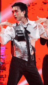 a man is wearing a crop top and a tie