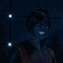a person with blue paint on their face and teeth is smiling