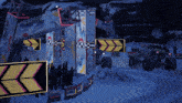 a monster truck is driving down a snowy road with arrows pointing in opposite directions