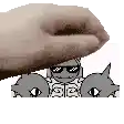 a hand is holding a cartoon character with sunglasses behind two cats .