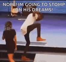 a man is going to stomp on his dreams while a woman looks on