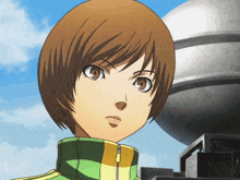 a close up of a girl 's face with short hair