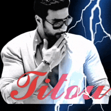 a man smoking a cigarette in front of a lightning bolt that says titosu