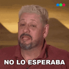 a man with blonde hair and a beard says no lo esperaba in spanish