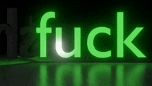 the word fuck is glowing in green on a black background .