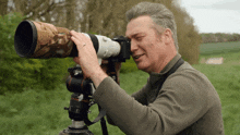 Shooting With A Camera Robert E Fuller GIF - Shooting With A Camera Robert E Fuller Taking A Picture GIFs