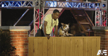 Leaping American Top Dog GIF - Leaping American Top Dog Over The Fence GIFs