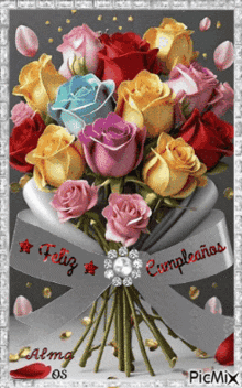 a bouquet of roses with the words feliz cumpleanos written on the bottom