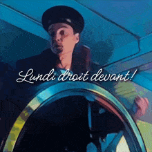 a drawing of a man behind a wheel with the words lundi droit devant