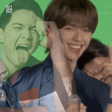 a picture of a man with his tongue out and the words kn1 yes out