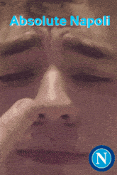 a poster for absolute napoli with a man 's nose
