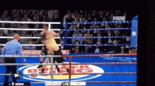 a boxing ring with a burger king logo in the middle