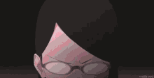 a close up of a girl wearing glasses with an angry expression on her face .