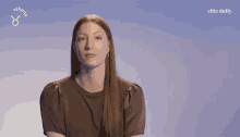 a woman with a taurus sign on her shirt