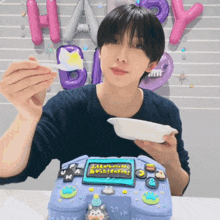 a man eating a cake that says happy birthday