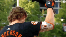 a baseball player with the name anderson on his shirt