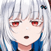 a close up of a girl 's face with red eyes
